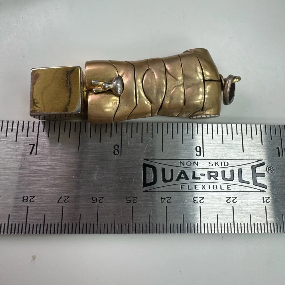 Brass Puzzle Pendant “Micro David” by Miguel Berrocal